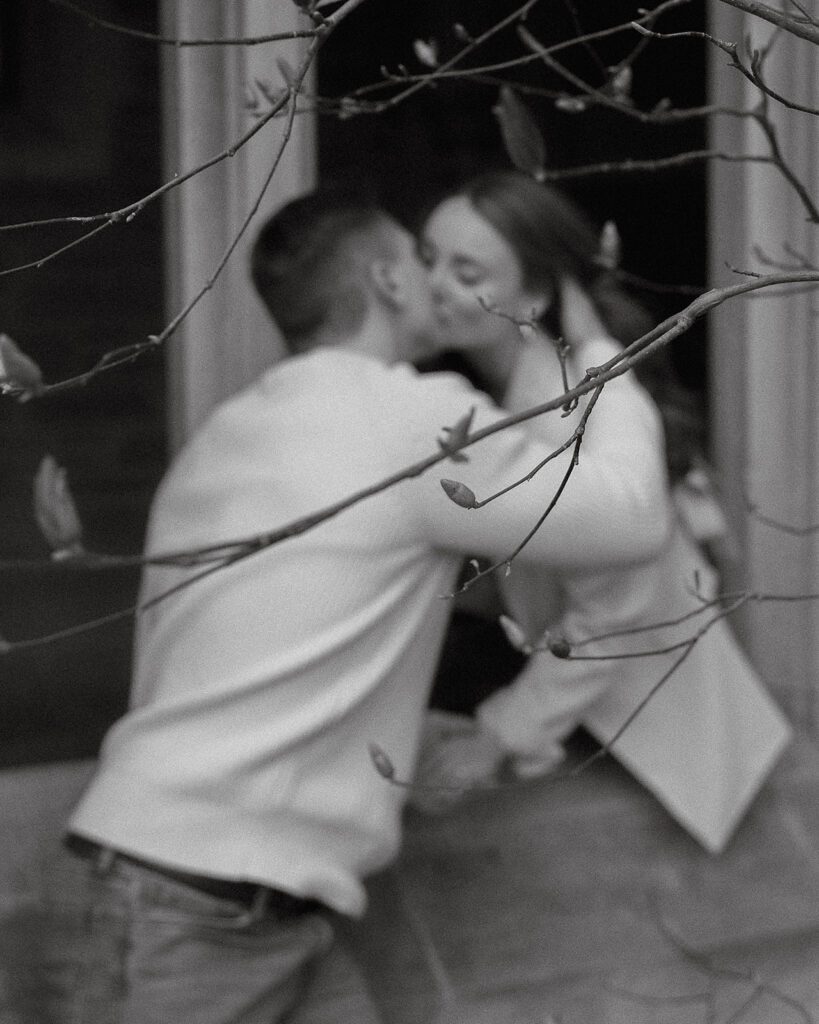 A couple kissing on their Princeton University engagement photos