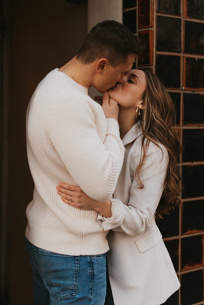 A couple kissing on their Princeton University engagement photos