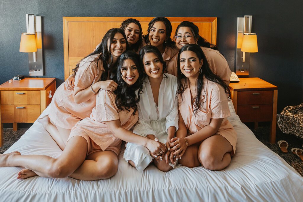 Beautiful bride with her bridesmaids