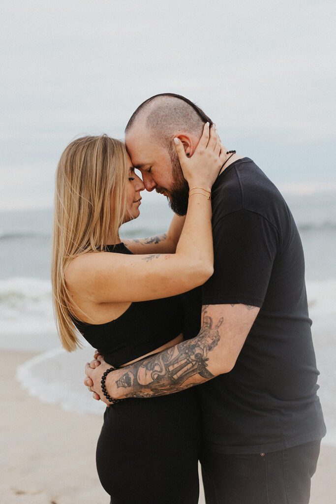 Sweet and playful engagement photos at the ocean
