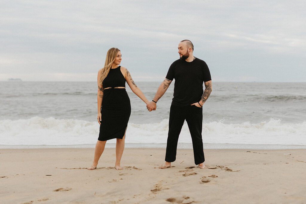 Sweet and playful engagement photos at the ocean