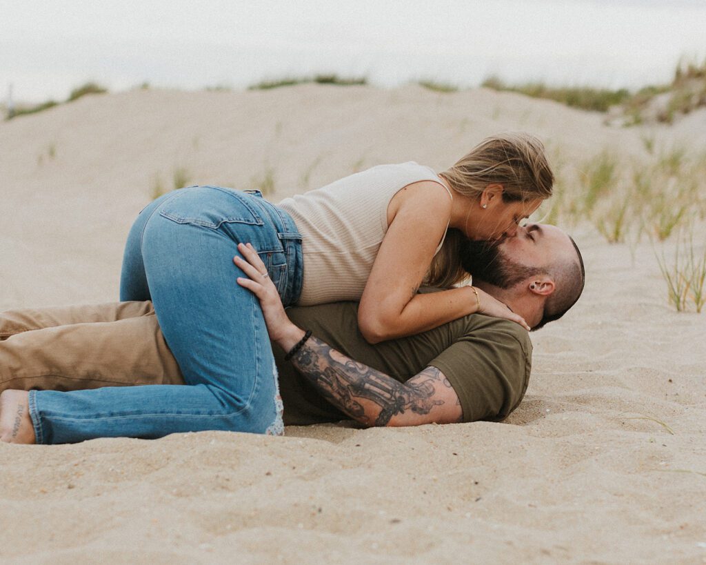 Sweet and playful photos from a Sandy Hook beach engagement shoot 