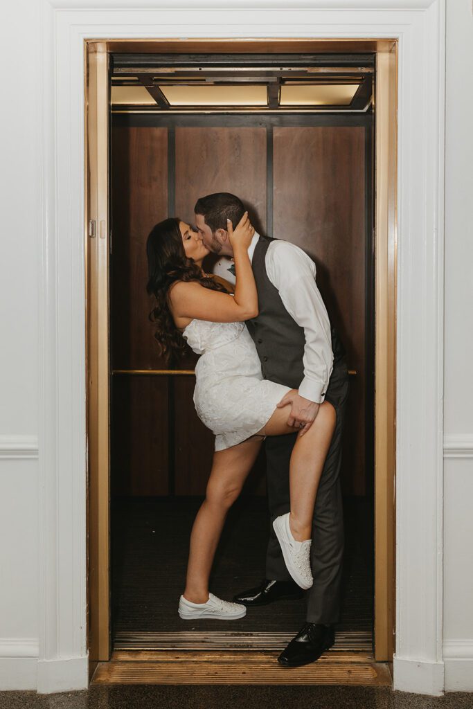 Bride and groom elevator photo