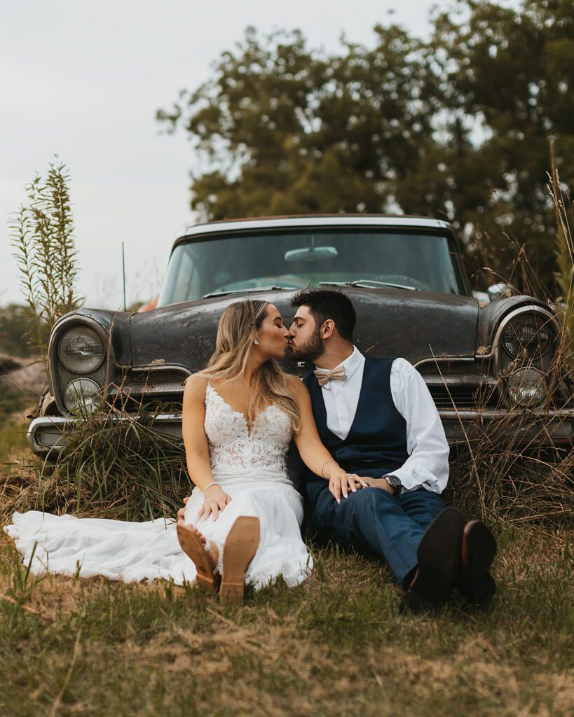 Bride and groom vintage car