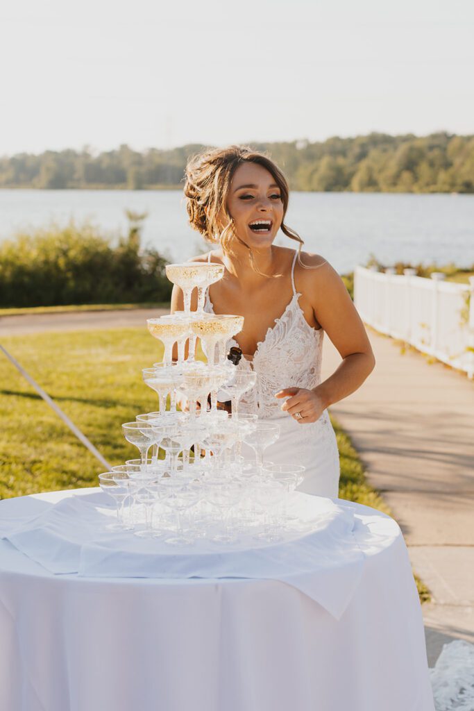 Bride and groom and champagne tower