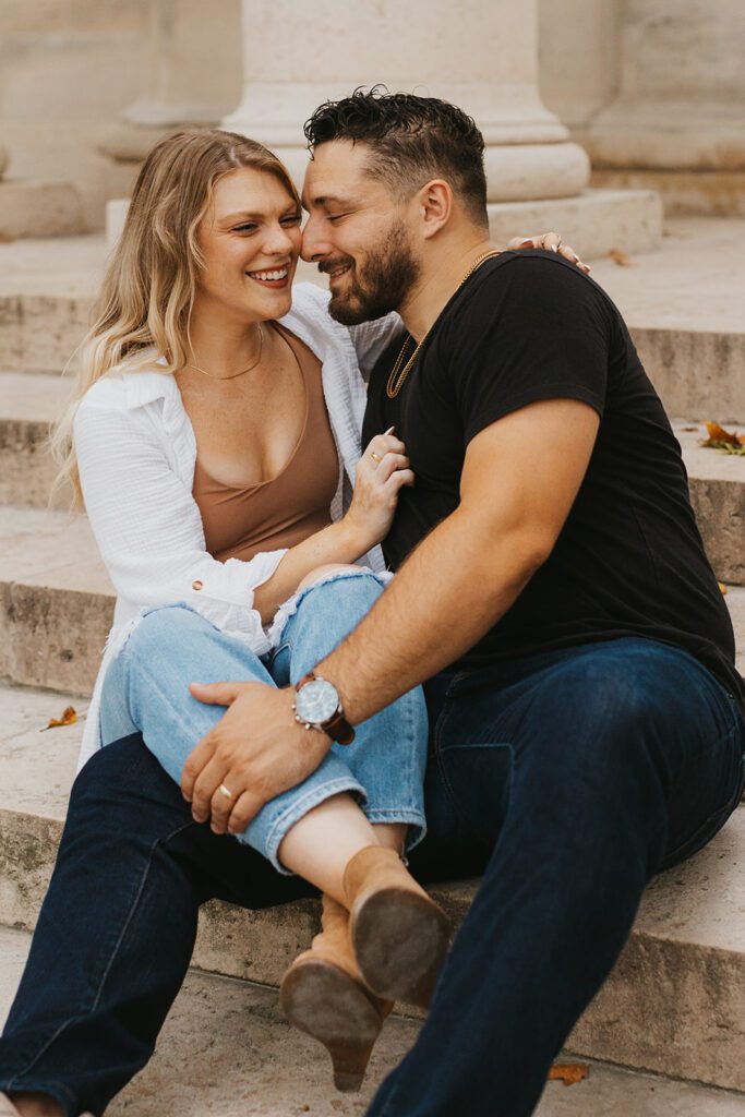 city engagement photo on the stairs in Philadelphia