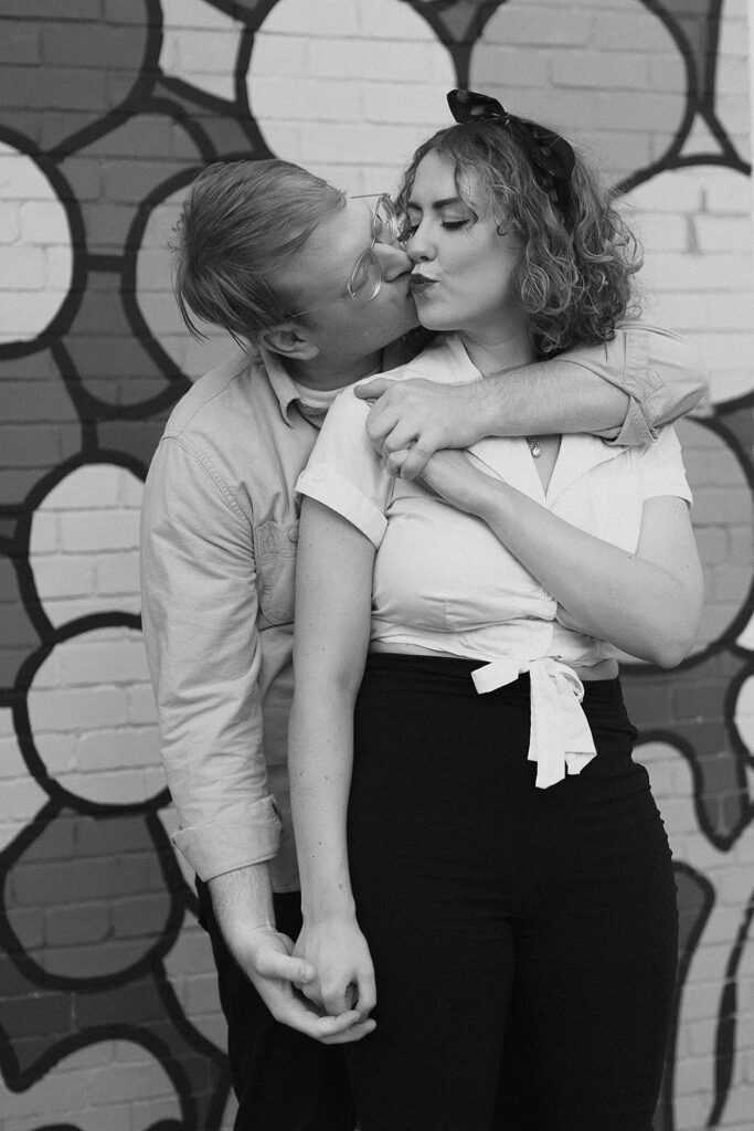 50s inspired retro downtown engagement photo