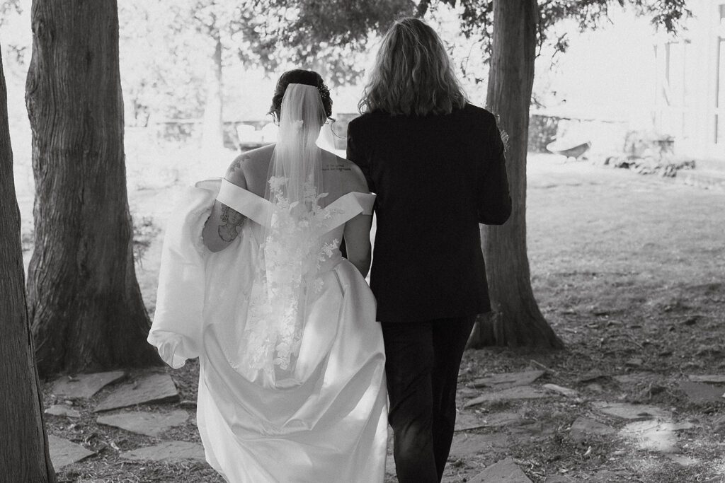 black and white bride and groom portrait from behind