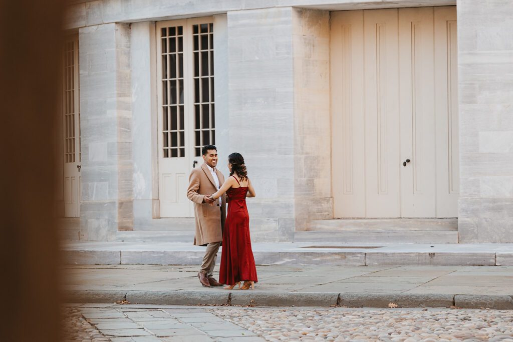 A tender embrace captured between Megan and Luis, set against the charming streets of Old City Philadelphia.