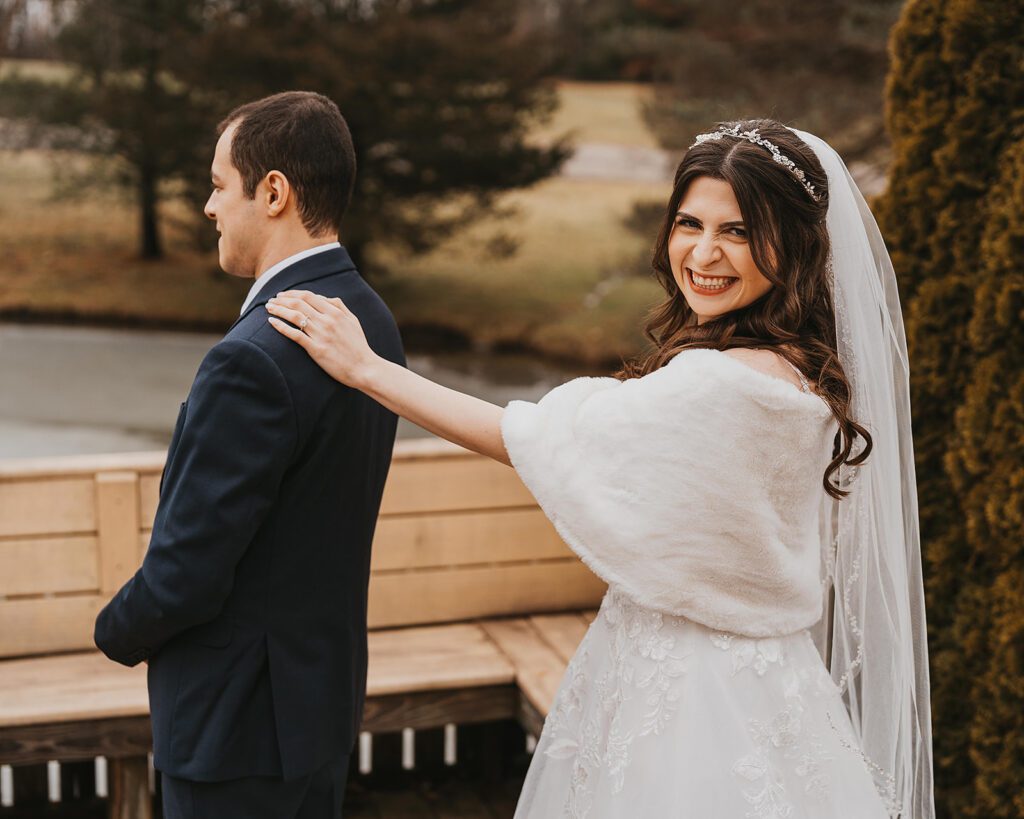 bride and groom first look outdoors during winter in the birch hill estates
