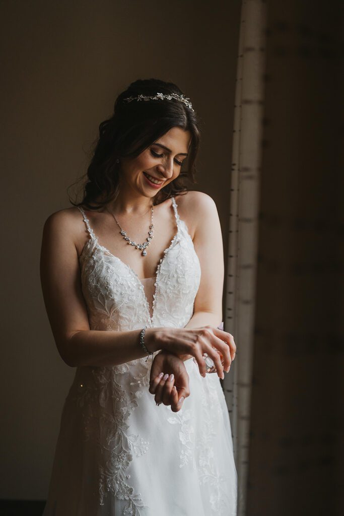 elegant and dreamy indoor bridal portraits by a window