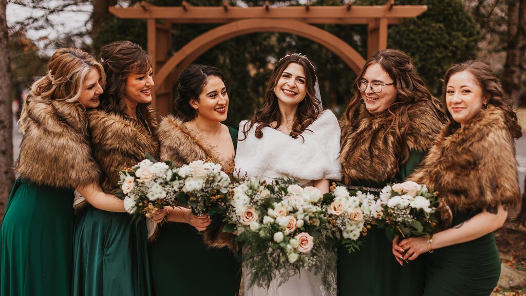 bride and bridesmaids, bridesmaids wearing dark green winter wedding bridesmaid dresses