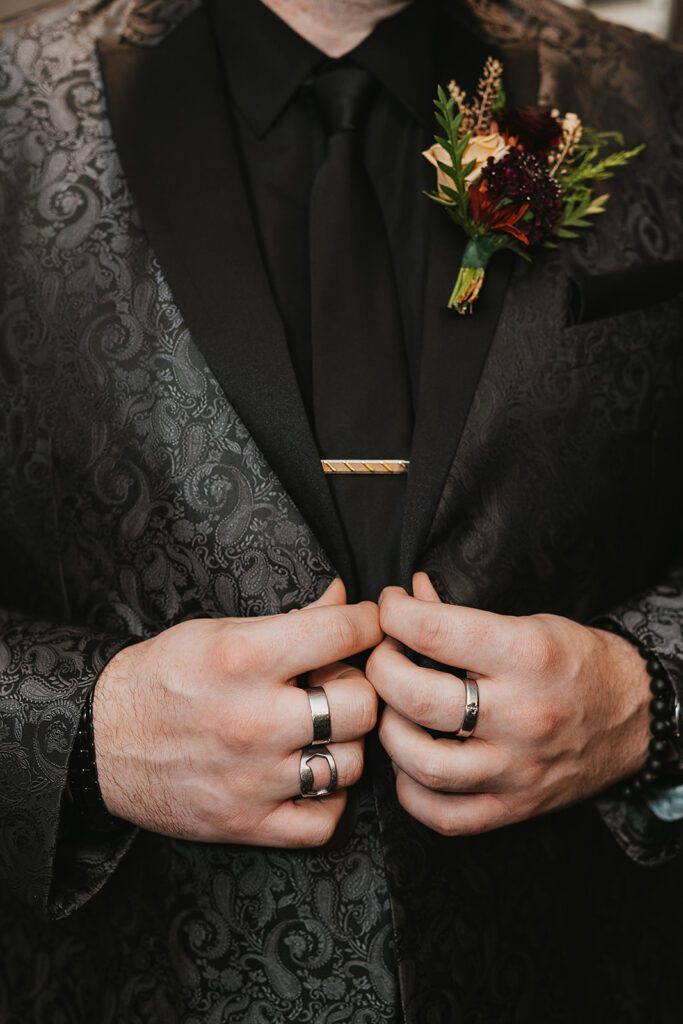 elegant groom in an all black wedding attire