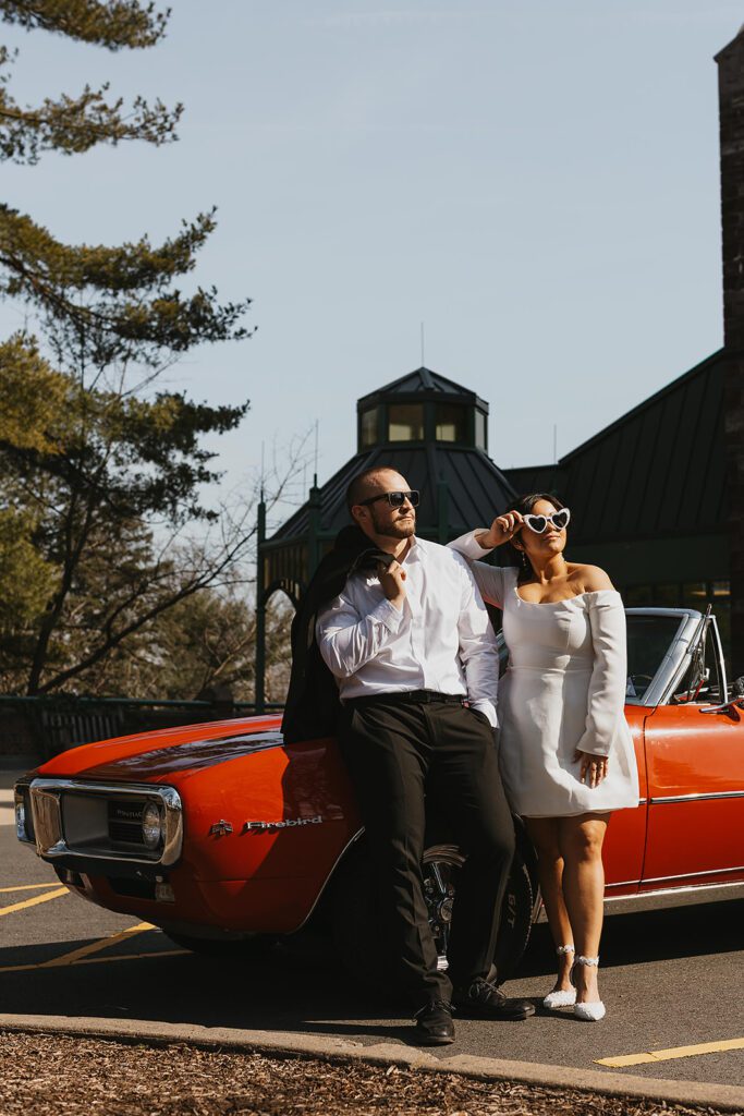 retro vibe engagement photo with a red cadillac