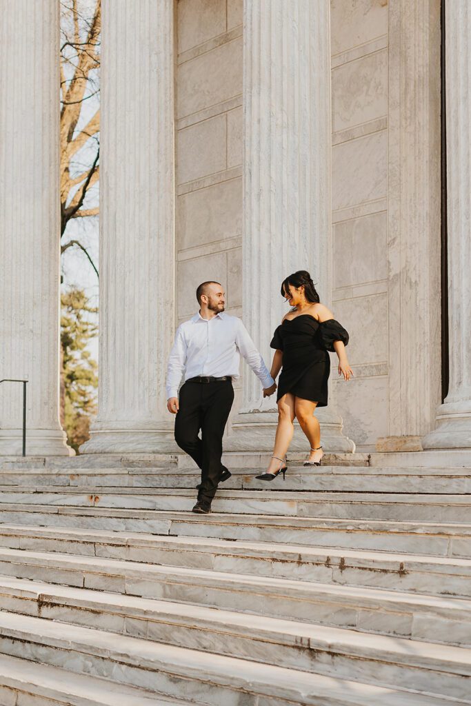 classy couple in downtown philadelphia during golden hour