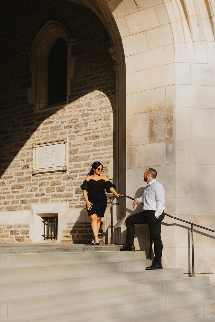 classy couple in downtown philadelphia during golden hour