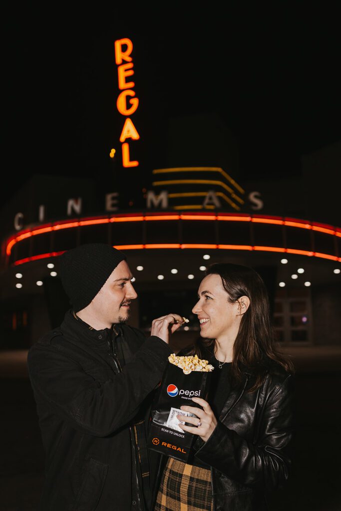 night time vintage movie theater engagement photos in philadelphia