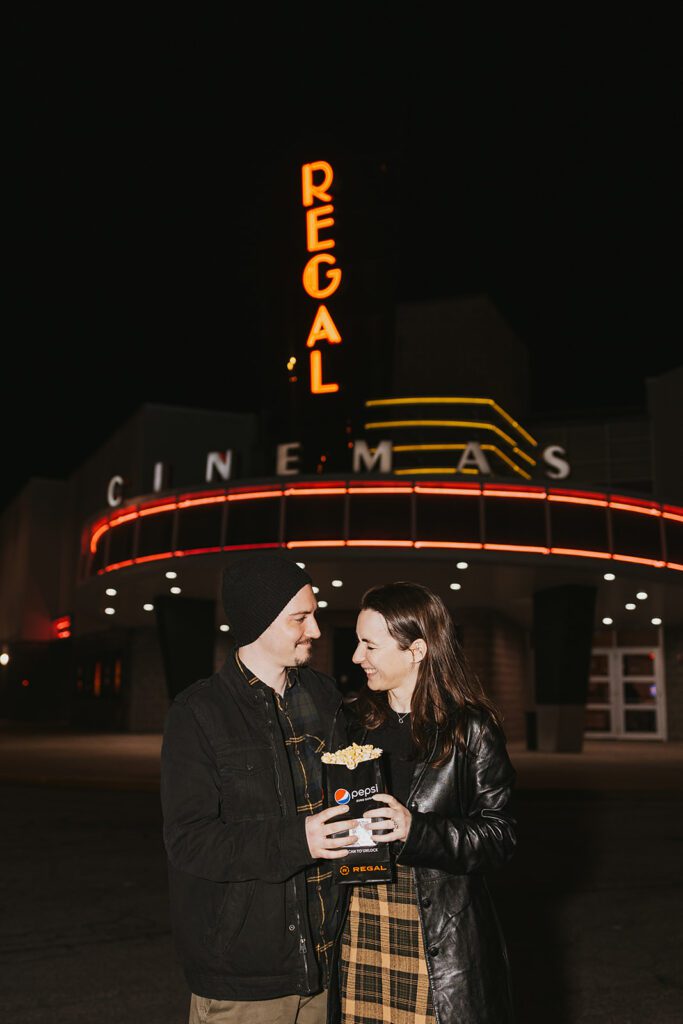 night time vintage movie theater engagement photos in philadelphia