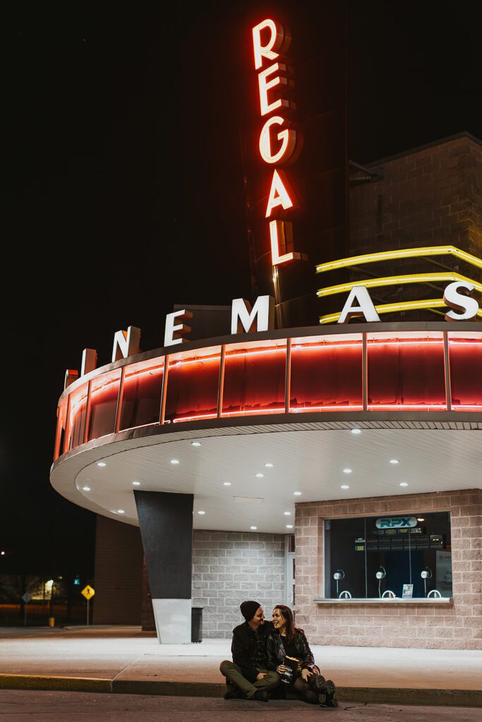 night time vintage movie theater engagement photos in philadelphia