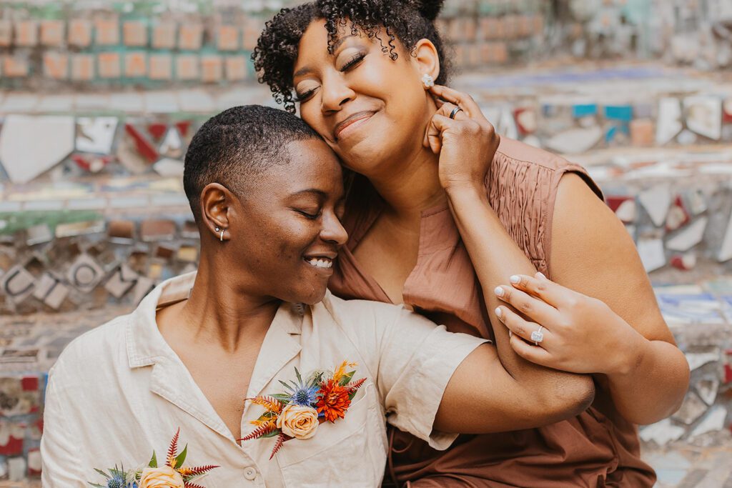 colorful lgbtq engagement photos in magic gardens, philadelphia