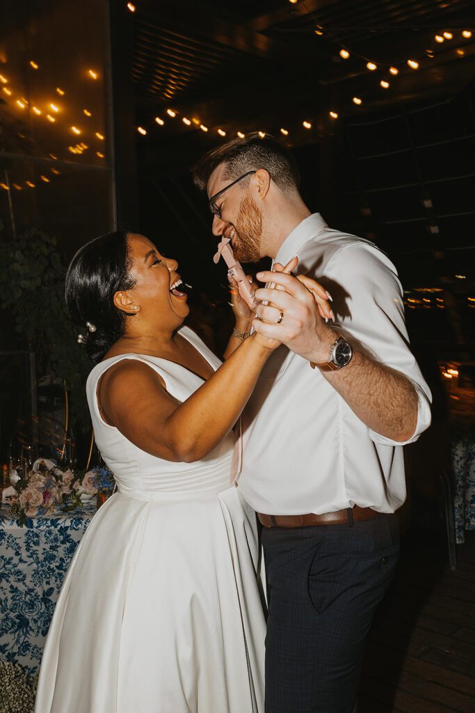 bride and groom dancing at their wedding reception