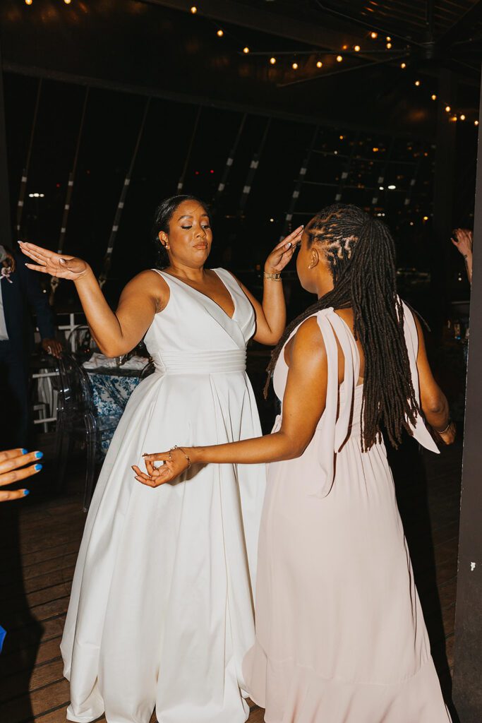 bride and groom dancing at their wedding reception