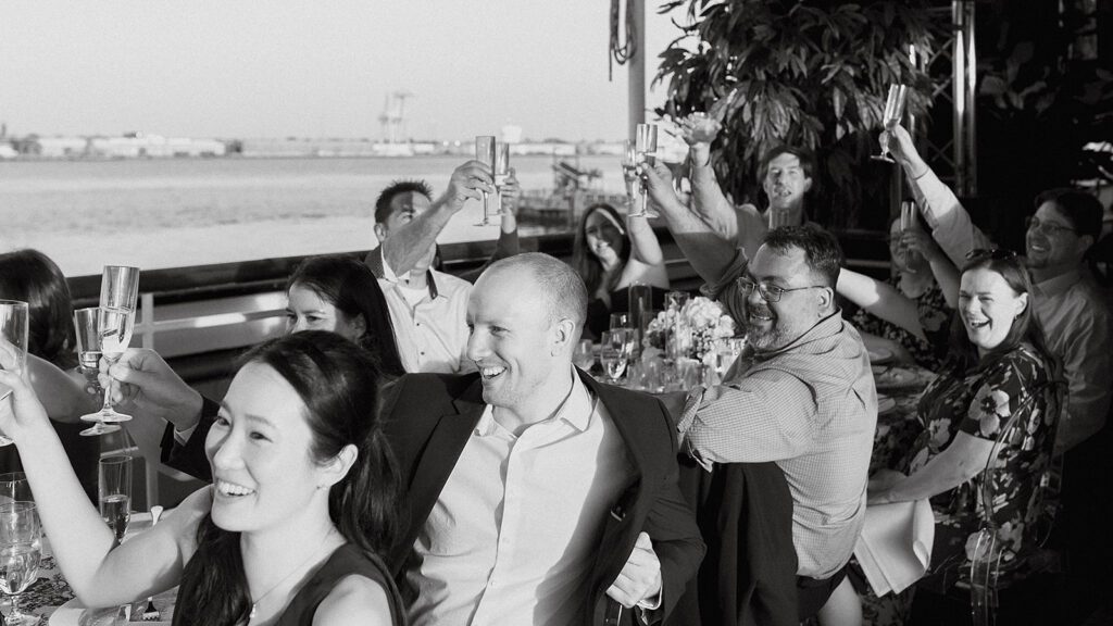 candid reception photos on Moshulu during a Philadelphia boat wedding