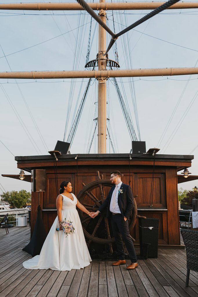 elegant bride and groom on Moshulu for their elegant boat wedding  in Philadelphia