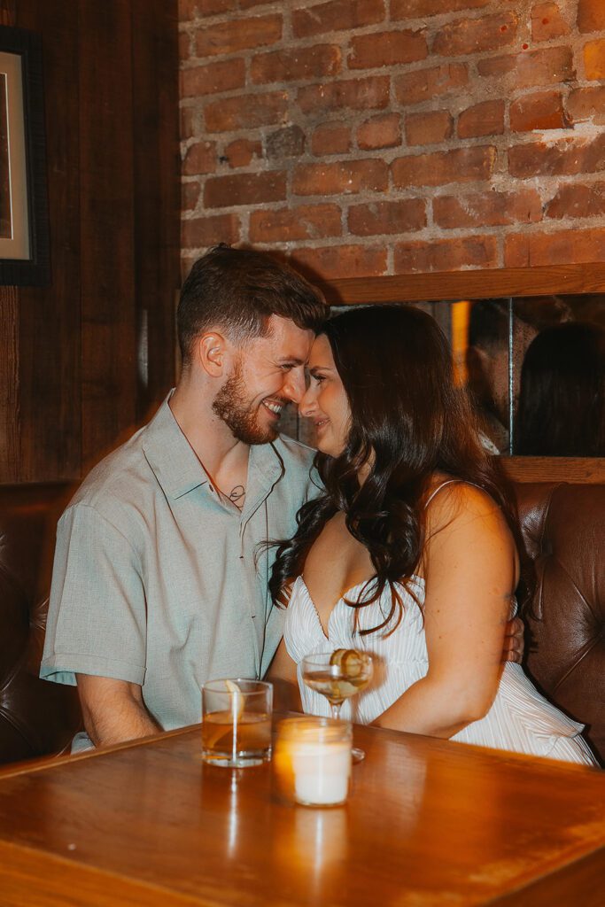 playful couple in Sweet Afton bar