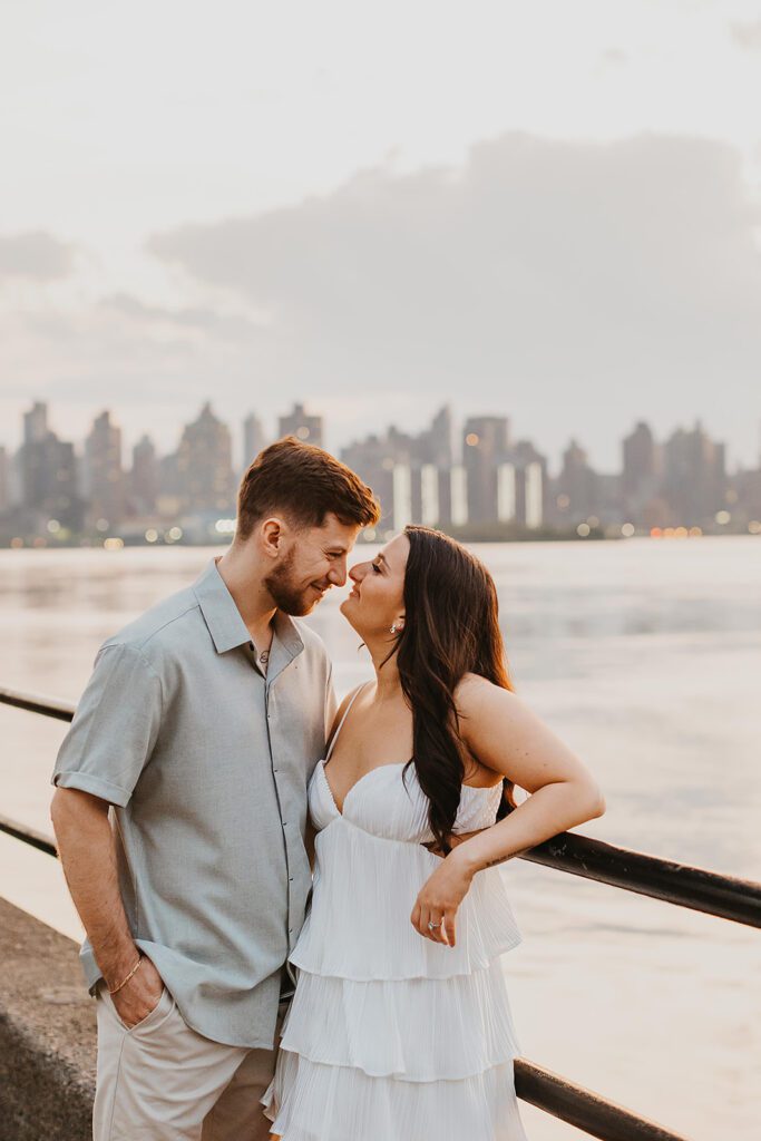 beautiful engagement photos with NYC skyline in the backdrop