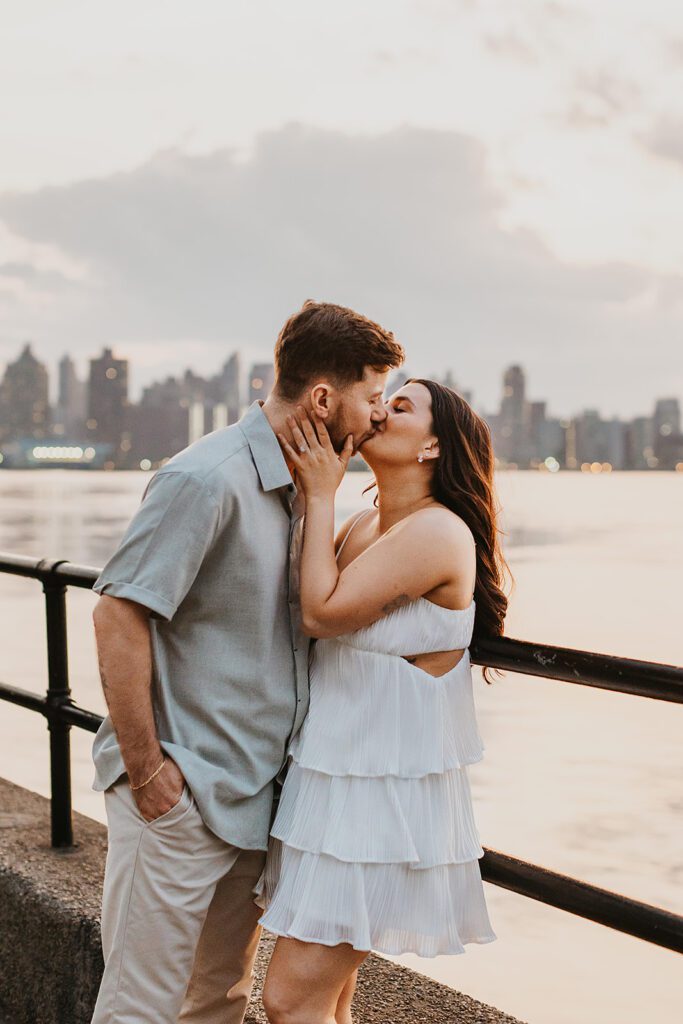 beautiful engagement photos with NYC skyline in the backdrop