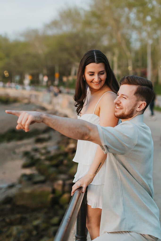 playful and candid couple during their nyc engagement photos