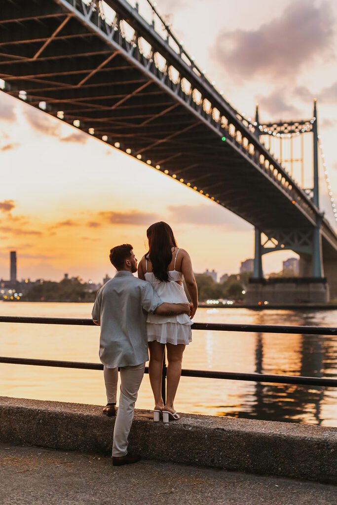 beautiful engagement photos with NYC skyline in the backdrop