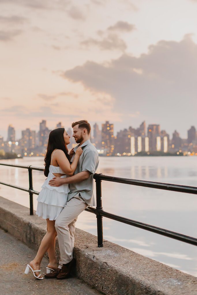 beautiful engagement photos with NYC skyline in the backdrop