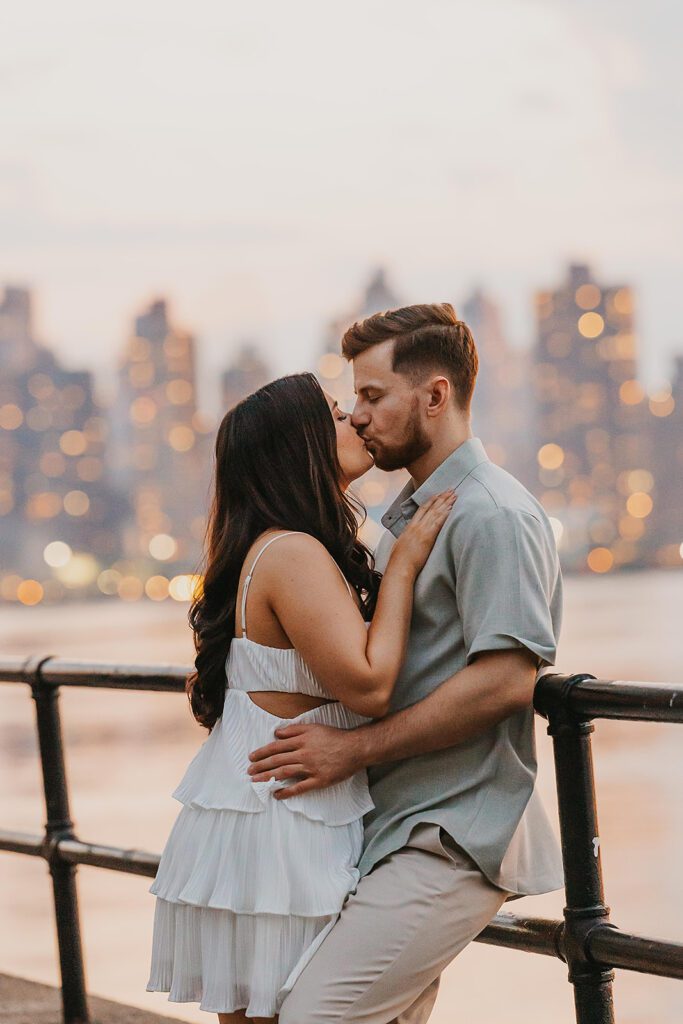 beautiful engagement photos with NYC skyline in the backdrop