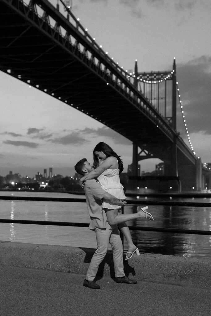 beautiful engagement photos with NYC skyline in the backdrop