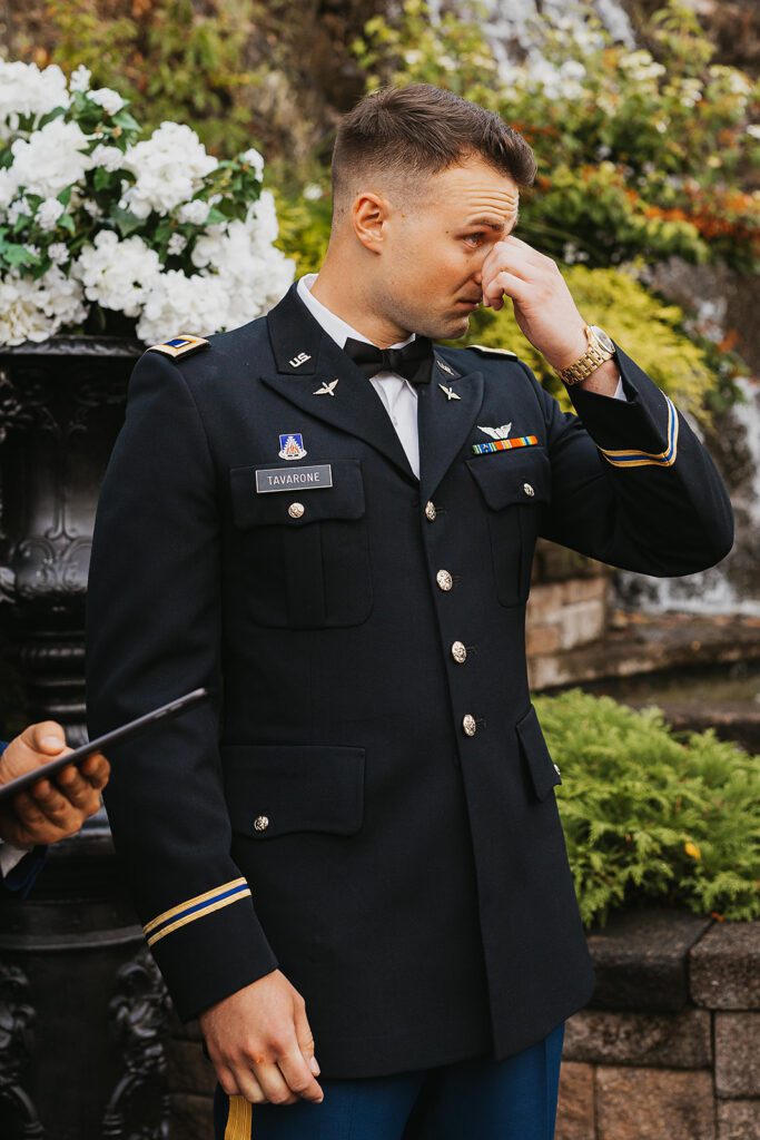 emotional groom during the wedding ceremony at Stroudsmoor Country Inn