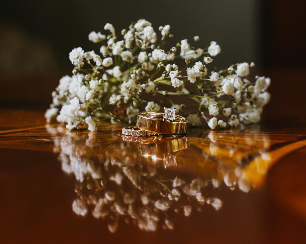 a close up shot of the wedding ring set