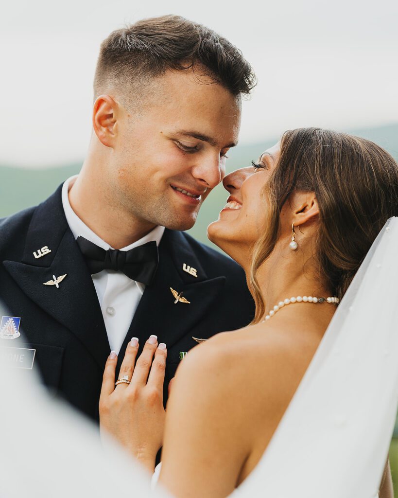 candid and playful bride and groom portraits during their Stroudsmoor Country Inn wedding