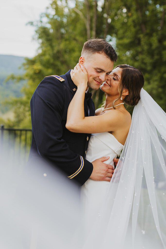 candid and playful bride and groom portraits during their Stroudsmoor Country Inn wedding