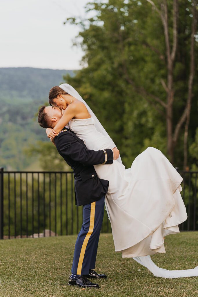 candid bride and groom photos during Stroudsmoor Country Inn wedding, groom is wearing his military uniform