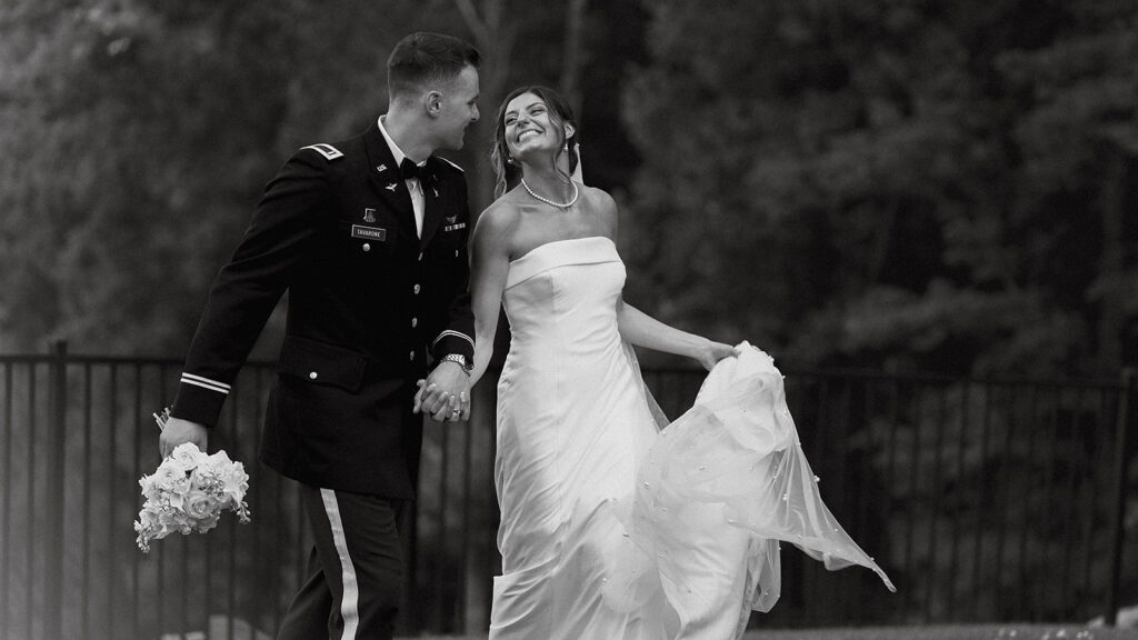 candid and playful bride and groom portraits during their Stroudsmoor Country Inn wedding